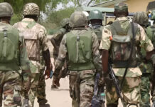 Tinubu Unveils Massive Military Pay Rise – See the New Salaries Nigerian Army: Soldiers arrest gunrunners