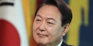 Protesters gather in Seoul after President Yoon Suk Yeol's martial law declaration.