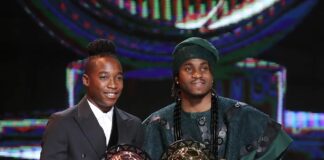 Ademola Lookman and Chiamaka Nnadozie receiving awards at CAF Awards 2024.