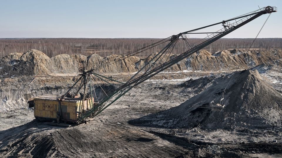 An excavator mines rare earth materials in the Zhytomyr region of Ukraine in February 2025, as companies continue operations despite the war.